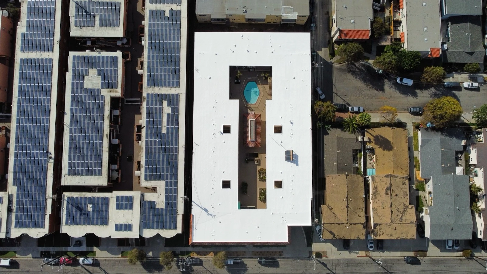 Aerial view commercial roofing with silicone coating Southern California