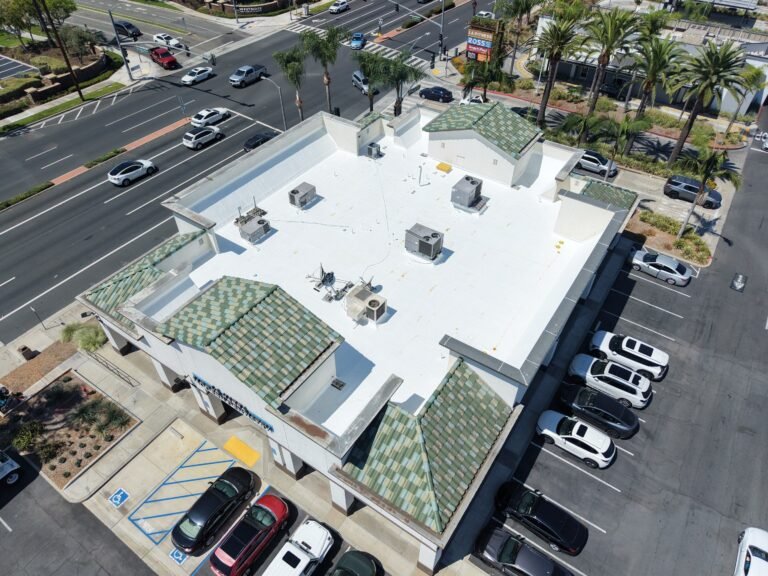 Commercial building rooftop view in Southern California intersection.