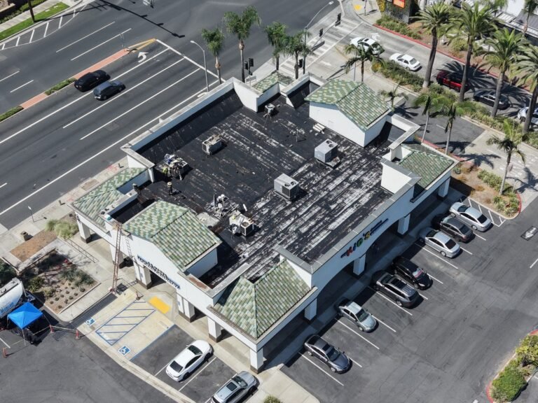Aerial view commercial building roof repair Southern California